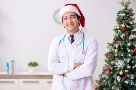 Doctor on the shift on christmas eveの写真素材