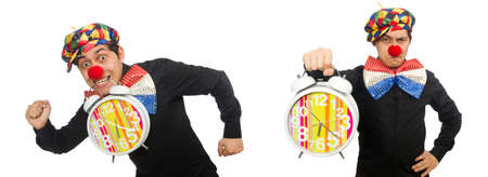 Funny clown with clock isolated on whiteの写真素材