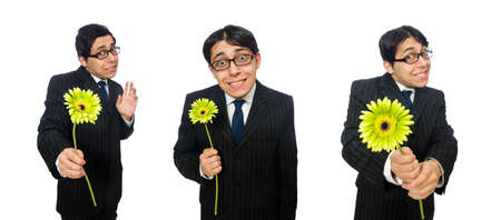 Young man in black costume with flower isolated on whiteの写真素材