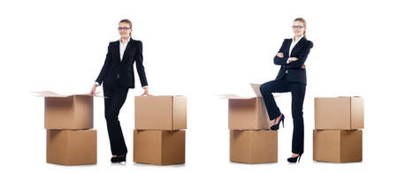 Businesswoman with boxes isolated on whiteの写真素材