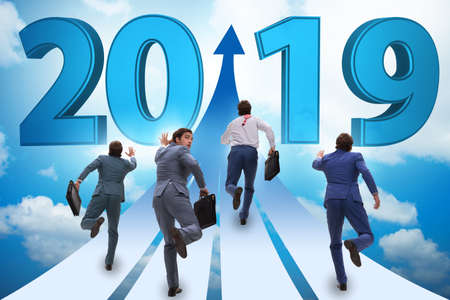 Businessman running into year of 2019