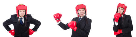Young employee with boxing gloves isolated on whiteの写真素材