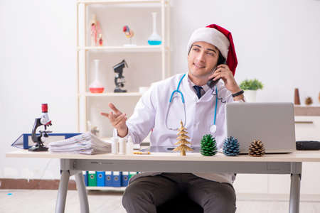 Doctor on the shift on christmas eveの写真素材