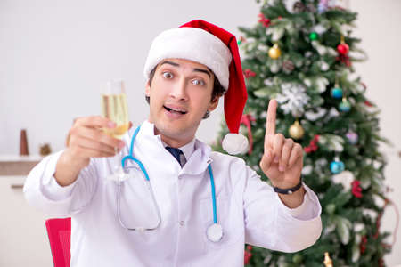 Doctor on the shift on christmas eveの写真素材