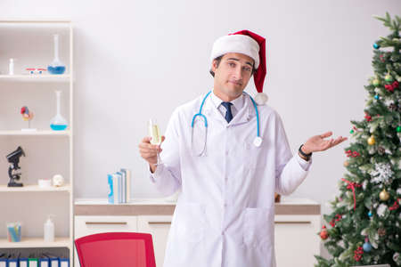 Doctor on the shift on christmas eveの写真素材