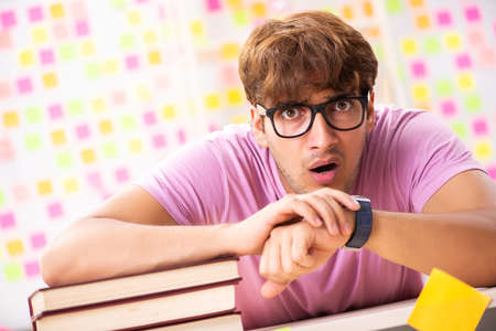 Student preparing for exams with many conflicting prioritiesの写真素材