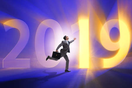 Businessman in the concept of transition to year 2019の写真素材