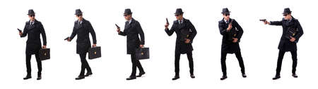 Man spy with handgun isolated on white backgroundの写真素材