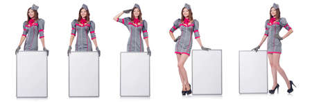 Young woman with blank board on whiteの写真素材