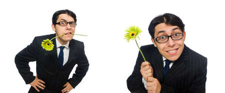 Young man in black costume with flower isolated on whiteの写真素材