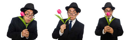 Young man in black costume with flower isolated on whiteの写真素材
