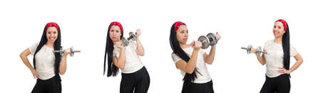 Young woman exercising with dumbbellsの写真素材