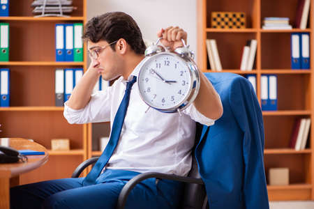 Young employee working in the officeの写真素材