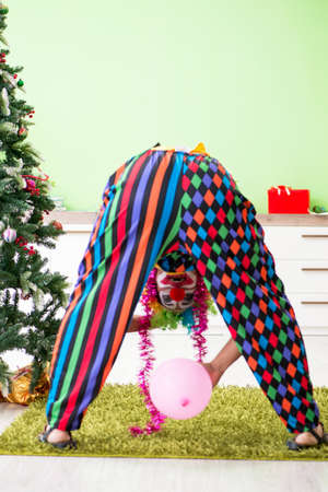 Funny clown in Christmas celebration concept