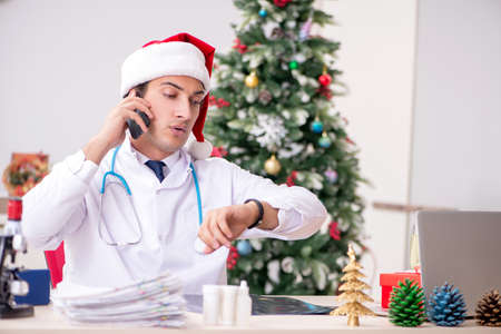 Doctor on the shift on christmas eveの写真素材
