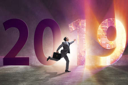 Businessman in the concept of transition to year 2019の写真素材