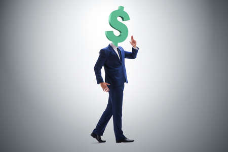 Businessman with dollar sign instead of headの写真素材