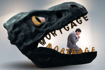 Businessman in the jaws of debt and loan