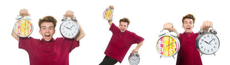 Student holding alarm clock isolated on whiteの写真素材