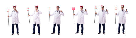 Devil doctor in funny medical concept isolated on white backgrouの写真素材