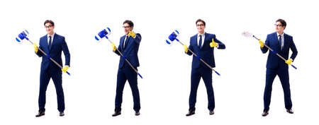 Young handsome businessman with mop isolated on whiteの写真素材