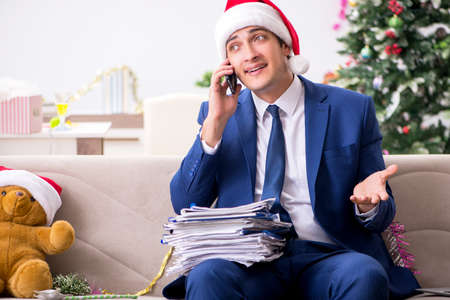 Busy employee working from homeの写真素材