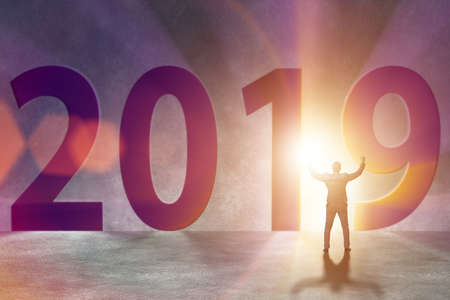 Businessman in the concept of transition to year 2019の写真素材