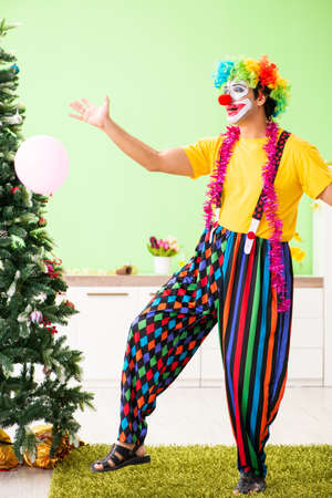 Funny clown in Christmas celebration concept