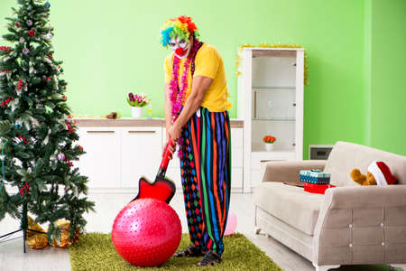 Funny clown in Christmas celebration concept