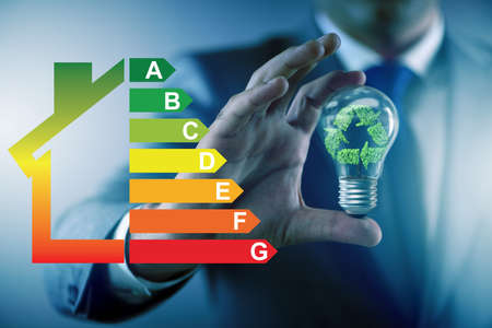 Businessman in energy efficiency conceptの写真素材