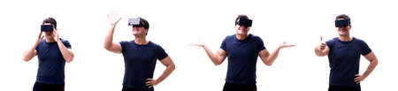 Young handsome man wearing virtual reality VR glasses isolated o