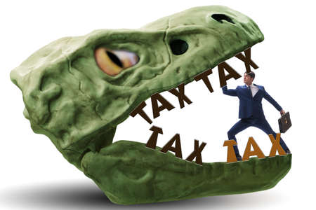 Businessman in high taxes conceptの写真素材