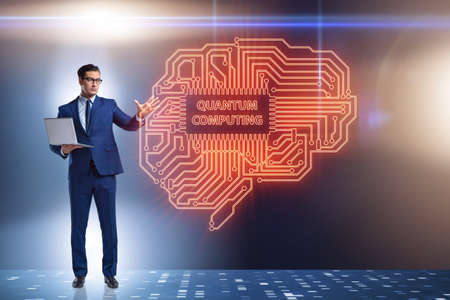 Businessman pressing virtual button in quantum computing concept