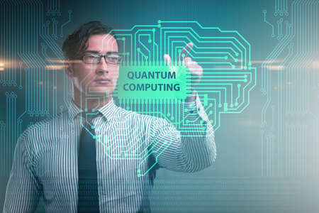 Businessman pressing virtual button in quantum computing conceptの写真素材