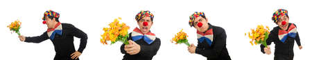 Funny clown with flowers isolated on whiteの写真素材