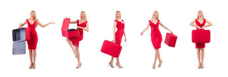 Woman in red dress and travel case isolated on whiteの写真素材