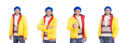 Young man in winter clothes isolated on whiteの写真素材