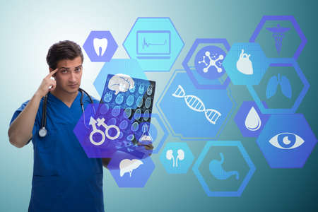 Doctor looking at x-ray image in telehealth conceptの写真素材