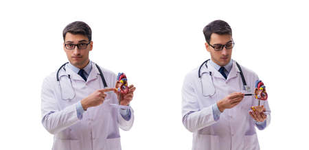 Young doctor with heart shape isolated on whiteの写真素材