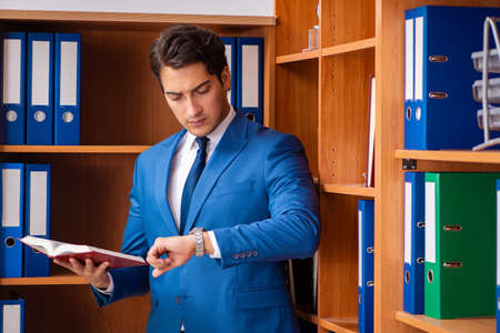 Young employee working in the officeの写真素材