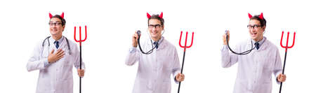 Devil doctor in funny medical concept isolated on white backgrouの写真素材