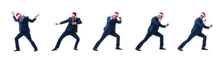 Young busnessman wearing santa hat in christmas concept on whiteの写真素材