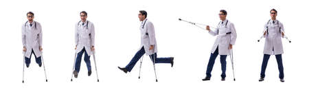 Young doctor physician standing walking isolated on white backgrの写真素材