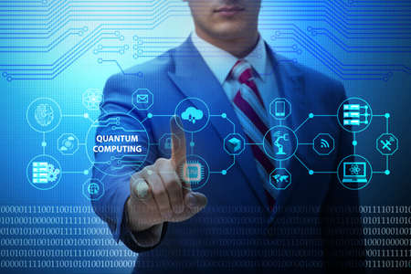Businessman pressing virtual button in quantum computing concept