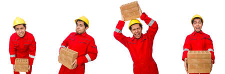 Construction worker with clay bricks on whiteの写真素材
