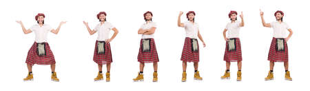 Man in scottish skirt isolated on whiteの写真素材