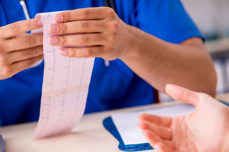 Young patient visiting doctor cardiologistの写真素材