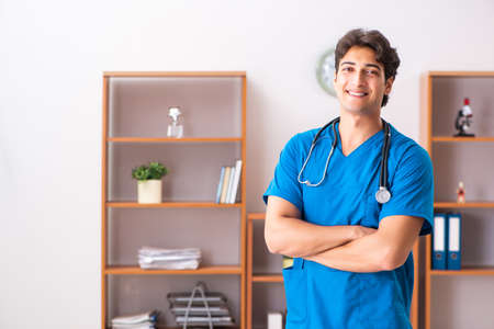 Young handsome doctor radiologyst working in clinicの写真素材