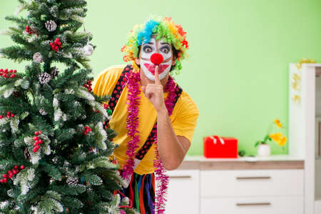 Funny clown in Christmas celebration concept