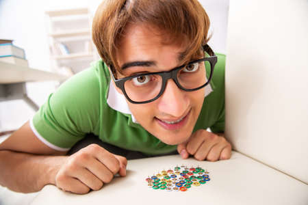 Office prank with sharp thumbtacks on chair